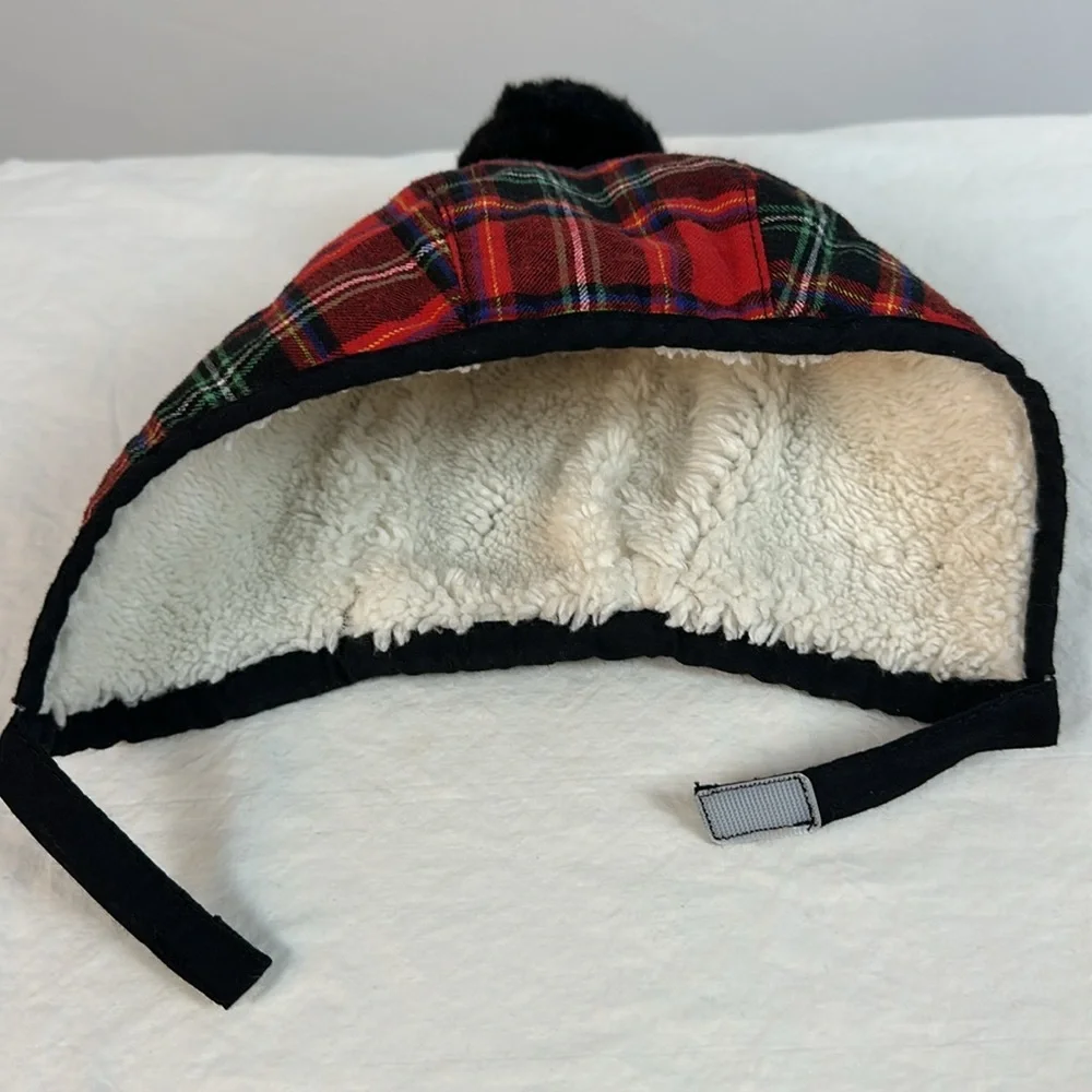 Plaid baby hat with black pom pom